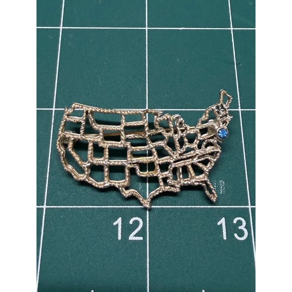 Vintage Goldish Tone USA Map Brooch Blue Rhinestone Patriotic United States Pin